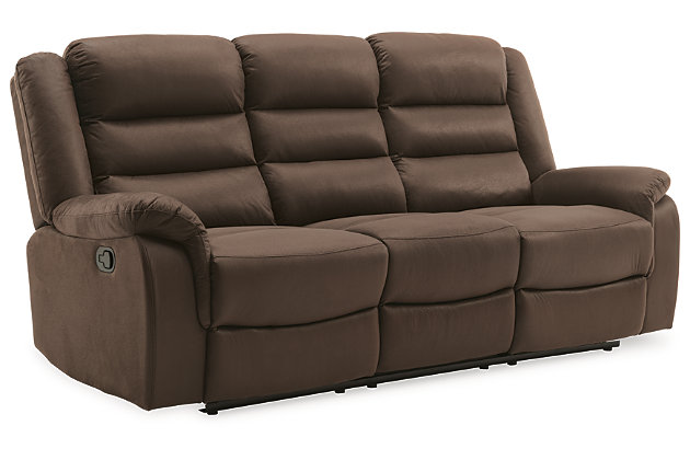 Embrace contemporary comfort with the Welota reclining sofa. Its richly neutral upholstery and no-fuss design give a new meaning to relaxed refinement. A double bustle back and curved armrests round out the look.Dual-sided recliner; middle seat remains stationary | Attached cushions | Brown upholstery | Pull tab reclining motion | Hidden drop-down table in the center seat | Estimated Assembly Time: 15 Minutes