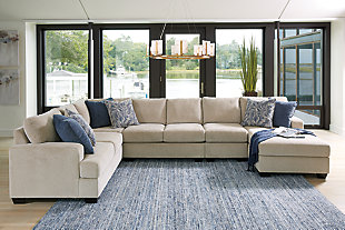 Establish a modern comfort zone with the Enola sectional. Spacious seating hosts reversible cushions and cozy back pillows for supportive comfort. Upholstered in sepia-colored polyester fabric, this sectional's frame is minimalistic with low track arms and short faux wood feet. Designer pillows pop with colorful patterns to round out the inviting look.Includes 5 pieces: right-arm facing corner chaise, armless loveseat, armless chair, left-arm facing loveseat and wedge | "Left-arm" and "right-arm" describe the position of the arm when you face the piece | Corner-blocked frame | Loose back pillows and seat cushions | Reversible cushions | High-resiliency foam cushions wrapped in thick poly and cotton fibers | Throw pillows included | Pillows with blended feather inserts and hidden zippers | Polyester upholstery; polyester chenille/polyester and polyester/cotton pillows | Exposed legs with faux wood finish | Estimated Assembly Time: 20 Minutes