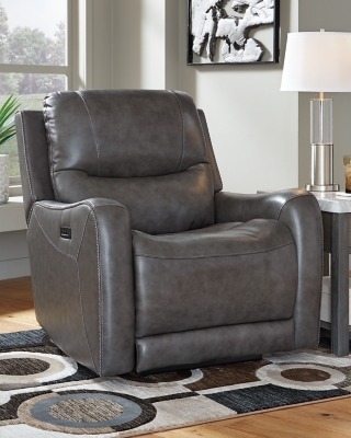 The Galahad power recliner might look crisp, clean and lean, but it’s packed with technologically advanced features that truly elevate the art of relaxation. Its zero-gravity mechanism lifts the ottoman four inches higher than traditional recliners (23" off the floor) for better blood flow from your legs to your heart. With the touch of a button, let the stress of the day float away care of an air massage system (with three pampering settings)—or get warm and toasty thanks to a heated seat element. While ultra streamlined, this designer recliner doesn’t cut corners when it comes to quality. The seating area and armrests are upholstered in genuine leather for incomparable comfort—where it counts. Crosshatch stitching adds fashion-forward flair.One-touch power control with adjustable positions, Easy View™ adjustable headrest and zero-draw USB plug-in | Zero-draw technology only consumes power when the USB receptacle is in use | Air massage system includes 3 settings: steady, pulse and wave (with automatic 20-minute shutoff feature) | Heat in the seat element (with automatic 30-minute shutoff feature) | Corner-blocked frame with metal reinforced seat | Attached back and seat cushions | High-resiliency foam cushions wrapped in thick poly fiber | Zero-gravity mechanism (raises the ottoman to 23" off the floor for improved blood flow) | Extended ottoman for enhanced comfort | Leather interior upholstery; vinyl/polyester exterior upholstery | Power cord included; UL Listed | Estimated Assembly Time: 15 Minutes