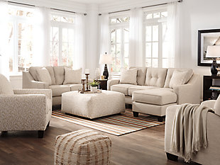 Whether you have kids or pets, or you simply love a low-maintenance way of life, the Aldie Nuvella® sofa chaise will surely have you sitting pretty. Plush to the touch yet incredibly durable, its stain- and abrasion-resistant Nuvella upholstery is a dream come true. And talk about no muss-no fuss design at its best. With its crisp, linear profile, sleek track arms and button-tufted back cushions, what a beautiful interpretation of mid-century modern style. Versatile chaise has a movable ottoman and reversible cushion and can be used on right or left side.Corner-blocked frame | Attached back and loose seat cushions | High-resiliency foam cushions wrapped in thick poly fiber | 2 accent pillows included | Polyester pillows with soft polyfill | Easy-clean polyester (Nuvella®) upholstery remains vibrant and resists stains | Clean fabric with mild soap and water, let air dry; for stubborn stains, use a solution of 1 cup bleach to 1 gallon water | Exposed feet with faux wood finish | Chaise can be positioned on either side (thanks to reversible seat cushion and movable ottoman)
