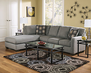 The Zella sectional beautifully pairs your love for kick-back comfort and your appreciation for clean, contemporary design. Back cushions are structured yet plush, while chaise brings neat dimension and a cool lounging place into your space.Includes 2 pieces: left-arm facing chaise and right-arm facing sofa | Corner-blocked frame | Tight back and loose seat cushions | High-resiliency foam cushions wrapped in thick poly fiber | 2 decorative pillows included | Pillows with soft polyfill | Polyester upholstery; polyester and rayon/polyester pillows | Exposed legs with faux wood finish | “Left-arm” and right-arm” describes the position of the arm when you face the piece | Estimated Assembly Time: 5 Minutes