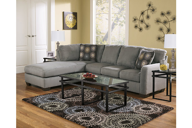 The Zella sectional beautifully pairs your love for kick-back comfort and your appreciation for clean, contemporary design. Back cushions are structured yet plush, while chaise brings neat dimension and a cool lounging place into your space.Includes 2 pieces: left-arm facing chaise and right-arm facing sofa | Corner-blocked frame | Tight back and loose seat cushions | High-resiliency foam cushions wrapped in thick poly fiber | 2 decorative pillows included | Pillows with soft polyfill | Polyester upholstery; polyester and rayon/polyester pillows | Exposed legs with faux wood finish | “Left-arm” and right-arm” describes the position of the arm when you face the piece | Estimated Assembly Time: 5 Minutes
