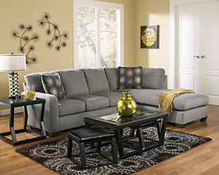 The Zella sectional beautifully pairs your love for kick-back comfort and your appreciation for clean, contemporary design. Back cushions are structured yet plush, while chaise brings neat dimension and a cool lounging place into your space.Includes 2 pieces: right-arm facing chaise and left-arm facing sofa | Corner-blocked frame | Tight back and loose seat cushions | High-resiliency foam cushions wrapped in thick poly fiber | 2 decorative pillows included | Pillows with soft polyfill | Polyester upholstery; polyester and rayon/polyester pillows | Exposed legs with faux wood finish | “Left-arm” and right-arm” describes the position of the arm when you face the piece | Estimated Assembly Time: 5 Minutes