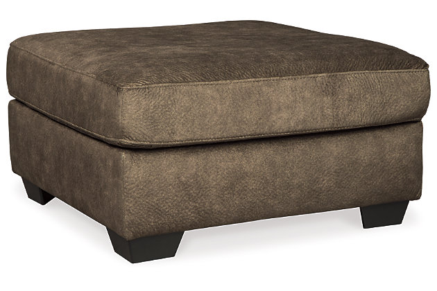 Looking for the perfect blend of decadent comfort and contemporary flair? Feast your eyes on the Accrington ottoman. Its oversized square profile definitely takes center stage. Wonderfully plush to the touch, the ottoman’s earthy brown fabric is the ultimate choice for a richly neutral look.Corner-blocked frame | Firmly cushioned | High-resiliency foam cushion wrapped in thick poly fiber | Polyester upholstery | Exposed feet with faux wood finish | Excluded from promotional discounts and coupons