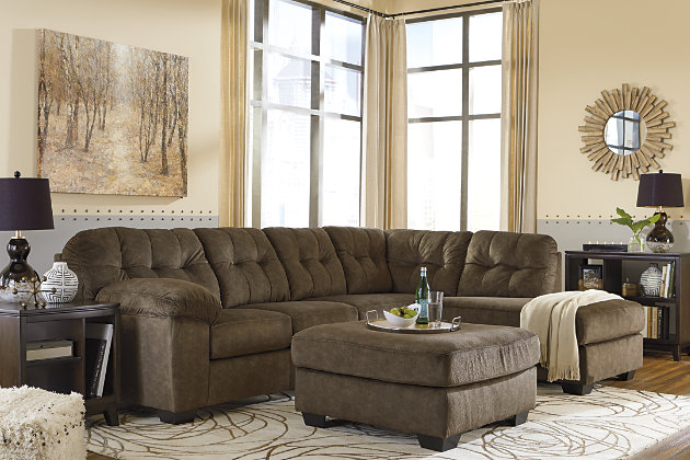Looking for the perfect blend of decadent comfort and contemporary flair? Feast your eyes on the Accrington sectional. Tufted box cushioning and thick pillow top armrests brilliantly merge style and a sumptuous feel. Wonderfully plush to the touch, the sectional’s earthy brown-tone fabric is the ultimate choice for a richly neutral look.Includes 2 pieces: left-arm facing sofa and right-arm facing corner chaise | "Left-arm" and "right-arm" describe the position of the arm when you face the piece | Corner-blocked frame | Attached back and loose seat cushions | High-resiliency foam cushions wrapped in thick poly fiber | Polyester upholstery | Exposed feet with faux wood finish | Estimated Assembly Time: 5 Minutes