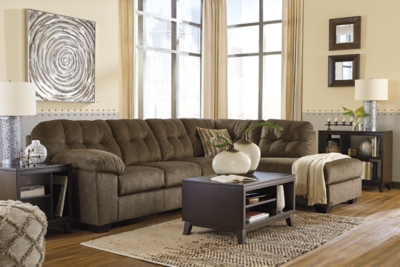 Looking for the perfect blend of decadent comfort and contemporary flair? Feast your eyes on the Accrington sectional. Tufted box cushioning and thick pillow top armrests brilliantly merge style and a sumptuous feel. Wonderfully plush to the touch, the sectional’s earthy brown-tone fabric is the ultimate choice for a richly neutral look.Includes 2 pieces: left-arm facing sofa and right-arm facing corner chaise | "Left-arm" and "right-arm" describe the position of the arm when you face the piece | Corner-blocked frame | Attached back and loose seat cushions | High-resiliency foam cushions wrapped in thick poly fiber | Polyester upholstery | Exposed feet with faux wood finish | Estimated Assembly Time: 5 Minutes