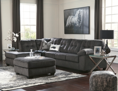 Looking for the perfect blend of decadent comfort and contemporary flair? Feast your eyes on the Accrington sectional. Tufted box cushioning and thick pillow top armrests brilliantly merge style and a sumptuous feel. Wonderfully plush to the touch, the sectional’s granite gray fabric is the ultimate choice for a chic, trendy look.Includes 2 pieces: left-arm facing corner chaise and right-arm facing sofa | "Left-arm" and "right-arm" describe the position of the arm when you face the piece | Corner-blocked frame | Attached back and loose seat cushions | High-resiliency foam cushions wrapped in thick poly fiber | Polyester upholstery | Exposed feet with faux wood finish | Estimated Assembly Time: 5 Minutes