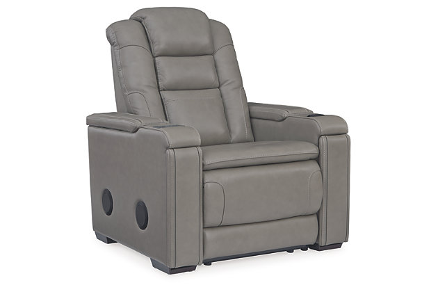 Power up with the ultra-modern Boerna power recliner. Inspired by sports car interiors, the seating area is covered in real leather for your pleasure. An advanced one-touch power control puts everything at your fingertips, including an Easy View™ power headrest, USB port and wireless charging for your phone. If that’s not enough, how does this sound? Integrated wireless speakers, armrests with storage, and pull-out compartments to keep cup holders out of sight yet right at hand.One-touch power control with Easy View™ power adjustable headrest, USB charging and wireless phone charging | Wireless charger accommodates later model smartphones, including Apple iPhone, Samsung Galaxy, Huawei Mate and Nokia Lumia | Wireless speakers for surround sound listening pleasure | Corner-blocked frame with metal reinforced seat | Attached cushions | High-resiliency foam cushions wrapped in thick poly fiber | Leather interior upholstery; vinyl/polyester exterior upholstery | Each armrest includes storage compartment | Hidden base compartments revealing stainless steel cup holders (removable for easy cleaning) | Extended ottoman for enhanced comfort | Power cord included; UL Listed | Estimated Assembly Time: 15 Minutes