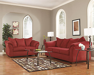Talk about fine lines and great curves. That’s the beauty of the Darcy loveseat—made to suit your appreciation for clean, contemporary style. A striking flared frame, comfy pillow top armrests and an ultra-soft upholstery that holds up to everyday living complete this fashion statement.Loose seat and attached back and armrest cushions | High-resiliency foam cushions wrapped in thick poly fiber | Polyester upholstery | Exposed feet with faux wood finish | Corner-blocked frame | Excluded from promotional discounts and coupons
