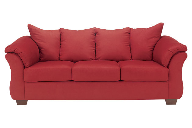 Talk about fine lines and great curves. That’s the beauty of the Darcy sofa—made to suit your appreciation for clean, contemporary style. A striking flared frame, comfy pillow top armrests and an ultra-soft upholstery that holds up to everyday living complete this fashion statement.Loose seat and attached back and armrest cushions | High-resiliency foam cushions wrapped in thick poly fiber | Polyester upholstery | Exposed feet with faux wood finish | Corner-blocked frame | Excluded from promotional discounts and coupons