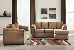 Talk about fine lines and great curves. That’s the beauty of the Darcy sofa chaise and loveseat set—made to suit your appreciation for clean, contemporary style. Striking flared profiles, comfy pillow top armrests and an ultra-soft upholstery that holds up to everyday living complete this fashion statement. Versatile chaise has a reversible cushion and can be used on right or left arm side.Includes sofa chaise and loveseat | Corner-blocked frames | Attached back and loose seat cushions | High-resiliency foam cushions wrapped in thick poly fiber | Polyester upholstery | Exposed feet with faux wood finish