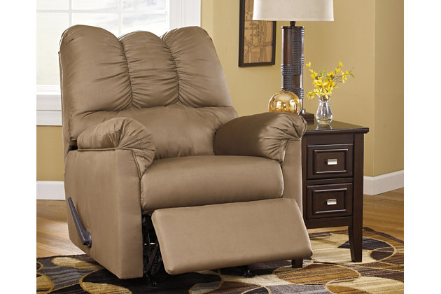 Talk about fine lines and great curves. That’s the beauty of the Darcy rocker recliner—made to suit your appreciation for clean, contemporary style. Comfy pillow top armrests, designer tailoring and an ultra-soft upholstery that holds up to everyday living complete this fashion statement.Attached back, seat and armrest cushions | Gentle rocking motion | High-resiliency foam cushions wrapped in thick poly fiber | Polyester upholstery | One-pull reclining motion | Corner-blocked frame with metal reinforced seat | Excluded from promotional discounts and coupons