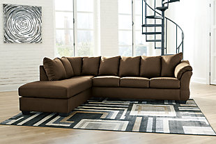 Talk about fine lines and great curves. That’s the beauty of the Darcy sectional—made to suit your appreciation for clean, contemporary style. A striking flared frame, comfy pillow top armrests and an ultra-soft upholstery that holds up to everyday living complete this fashion statement.Left-arm and "right-arm" describes the position of the arm when you face the piece | Corner-blocked frame | Attached back and loose seat cushions | High-resiliency foam cushions wrapped in thick poly fiber | Polyester upholstery | Exposed feet with faux wood finish | Estimated Assembly Time: 5 Minutes