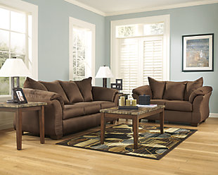 Talk about fine lines and great curves. That’s the beauty of the Darcy loveseat—made to suit your appreciation for clean, contemporary style. A striking flared frame, comfy pillow top armrests and an ultra-soft upholstery that holds up to everyday living complete this fashion statement.Loose seat and attached back and armrest cushions | High-resiliency foam cushions wrapped in thick poly fiber | Polyester upholstery | Exposed feet with faux wood finish | Corner-blocked frame | Excluded from promotional discounts and coupons