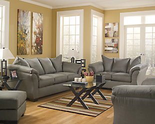 Talk about fine lines and great curves. That’s the beauty of the Darcy loveseat—made to suit your appreciation for clean, contemporary style. A stri flared frame, comfy pillow top armrests and an ultra-soft upholstery that holds up to everyday living complete this fashion statement.High-resiliency foam cushions wrapped in thick poly fiber | Polyester upholstery | Loose seat and attached back and armrest cushions | Exposed feet with faux wood finish | Corner-blocked frame | Excluded from promotional discounts and coupons