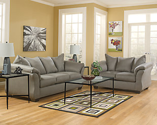 Talk about fine lines and great curves. That’s the beauty of the Darcy loveseat—made to suit your appreciation for clean, contemporary style. A striking flared frame, comfy pillow top armrests and an ultra-soft upholstery that holds up to everyday living complete this fashion statement.High-resiliency foam cushions wrapped in thick poly fiber | Polyester upholstery | Loose seat and attached back and armrest cushions | Exposed feet with faux wood finish | Corner-blocked frame | Excluded from promotional discounts and coupons