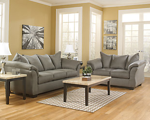 Talk about fine lines and great curves. That’s the beauty of the Darcy full sofa sleeper—made to suit your appreciation for clean, contemporary style. A striking flared frame, comfy pillow top armrests and an ultra-soft upholstery that holds up to everyday living complete this fashion statement. A pull-out full mattress means you’re fully prepared for overnight guests.Loose seat and attached back and armrest cushions | High-resiliency foam cushions wrapped in thick poly fiber | Polyester upholstery | Included bi-fold full memory foam mattress sits atop a supportive metal frame | Exposed feet with faux wood finish | Corner-blocked frame | Excluded from promotional discounts and coupons