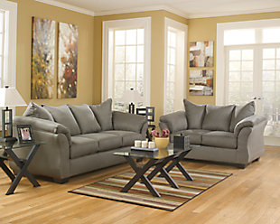 Talk about fine lines and great curves. That’s the beauty of the Darcy loveseat—made to suit your appreciation for clean, contemporary style. A stri flared frame, comfy pillow top armrests and an ultra-soft upholstery that holds up to everyday living complete this fashion statement.High-resiliency foam cushions wrapped in thick poly fiber | Polyester upholstery | Loose seat and attached back and armrest cushions | Exposed feet with faux wood finish | Corner-blocked frame | Excluded from promotional discounts and coupons