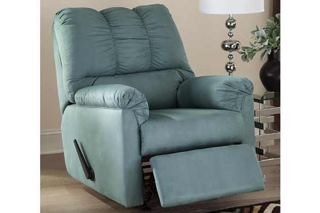 Talk about fine lines and great curves. That’s the beauty of the Darcy rocker recliner—made to suit your appreciation for clean, contemporary style. Comfy pillow top armrests, refined stitching and ultra-soft upholstery complete this fashion statement. Sky blue upholstery is a refreshing change from everyday ordinary reclining furniture.Reclining chair with gentle rocking motion | Attached back, seat and armrest cushions | High-resiliency foam cushions wrapped in thick poly fiber | Divided back cushion styling with puckered tailoring | Polyester upholstery in sky blue | Chair with one-pull reclining motion | Corner-blocked frame with metal reinforced seat | Excluded from promotional discounts and coupons