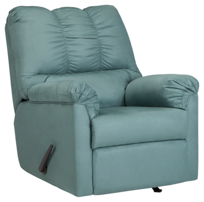 Talk about fine lines and great curves. That’s the beauty of the Darcy rocker recliner—made to suit your appreciation for clean, contemporary style. Comfy pillow top armrests, refined stitching and ultra-soft upholstery complete this fashion statement. Sky blue upholstery is a refreshing change from everyday ordinary reclining furniture.Reclining chair with gentle rocking motion | Attached back, seat and armrest cushions | High-resiliency foam cushions wrapped in thick poly fiber | Divided back cushion styling with puckered tailoring | Polyester upholstery in sky blue | Chair with one-pull reclining motion | Corner-blocked frame with metal reinforced seat | Excluded from promotional discounts and coupons