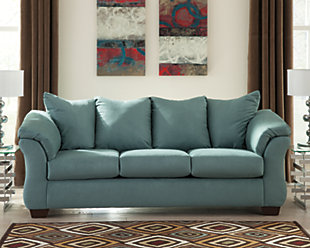 Talk about fine lines and great curves. That’s the beauty of the Darcy sofa—made to suit your appreciation for clean, contemporary style. A striking flared frame, comfy pillow top armrests and ultra-soft upholstery complete this fashion statement.High-resiliency foam cushions wrapped in thick poly fiber | Polyester upholstery | Loose seat and attached back and armrest cushions | Exposed feet with faux wood finish | Corner-blocked frame | Excluded from promotional discounts and coupons