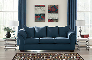 Talk about fine lines and great curves. That’s the beauty of the Darcy sofa—made to suit your appreciation for clean, contemporary style. A striking flared frame, comfy pillow top armrests and an ultra-soft upholstery that holds up to everyday living complete this fashion statement.Corner-blocked frame | Loose seat and attached back and armrest cushions | High-resiliency foam cushions wrapped in thick poly fiber | Polyester upholstery | Exposed feet with faux wood finish | Excluded from promotional discounts and coupons