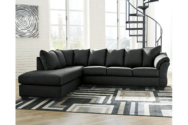 Talk about fine lines and great curves. That’s the beauty of the Darcy sectional—made to suit your appreciation for clean, contemporary style. A striking flared frame, comfy pillow top armrests and an ultra-soft upholstery that holds up to everyday living complete this fashion statement.Includes 2 pieces: left-arm facing corner chaise and right-arm facing sofa | Left-arm and "right-arm" describes the position of the arm when you face the piece | Corner-blocked frame | Attached back and loose seat cushions | High-resiliency foam cushions wrapped in thick poly fiber | Polyester upholstery | Exposed feet with faux wood finish | Estimated Assembly Time: 5 Minutes
