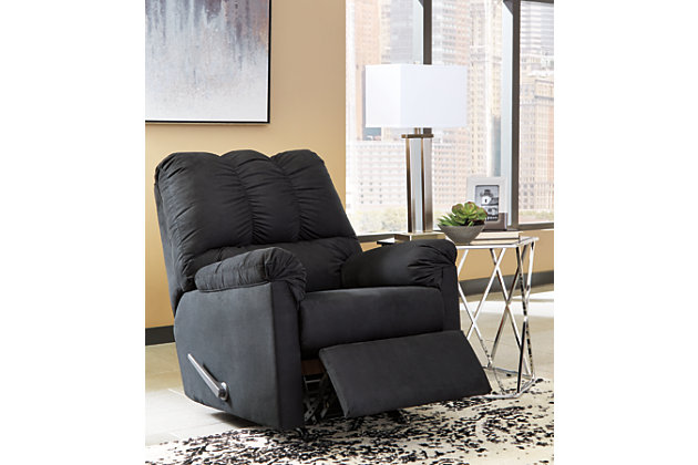 Talk about fine lines and great curves. That’s the beauty of the Darcy rocker recliner—made to suit your appreciation for clean, contemporary style. Comfy pillow top armrests, designer tailoring and an ultra-soft upholstery that holds up to everyday living complete this fashion statement.Gentle rocking motion | One-pull reclining motion | Corner-blocked frame with metal reinforced seat | Attached back and seat cushions | High-resiliency foam cushions wrapped in thick poly fiber | Polyester upholstery