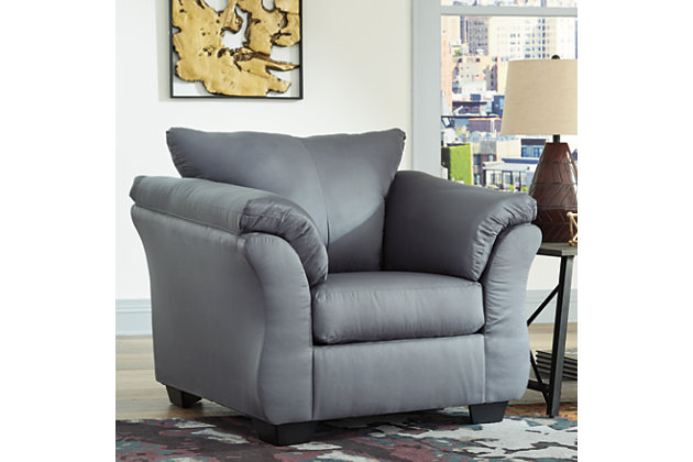 Talk about fine lines and great curves. That’s the beauty of the Darcy chair—made to suit your appreciation for simplicity and love of contemporary style. A striking flared frame, comfy pillow top armrests and an ultra-soft upholstery that holds up to everyday living complete this fashion statement.Corner-blocked frame | Attached back and loose seat cushions | High-resiliency foam cushions wrapped in thick poly fiber | Polyester upholstery | Exposed feet with faux wood finish