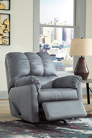 Talk about fine lines and great curves. That’s the beauty of the Darcy rocker recliner—made to suit your appreciation for clean, contemporary style. Comfy pillow top armrests, designer tailoring and an ultra-soft upholstery that holds up to everyday living complete this fashion statement.Corner-blocked frame with metal reinforced seat | Attached cushions | One-pull reclining motion | Gentle rocking motion | High-resiliency foam cushions wrapped in thick poly fiber | Polyester upholstery