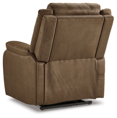 Enjoy comfort to the max in the Whitehill power lift recliner. After sitting and relaxing or snoozing in a fully reclined position, it eases you upright and back on your feet with the touch of a button. Dual motor capability lets you recline back and elevate your legs independently for custom comfort positioning. With USB charging at your fingertips, you can power up electronic devices as you unwind. The heavyweight padded faux leather has long-lasting durability, and its neutral chocolate hue complements most color schemes, so it looks as good as it feels.One-touch (hand control) power button with adjustable positions | Corner-blocked frame with metal seat box | Attached back and seat cushions | High-resiliency foam cushions wrapped in thick poly fiber | Polyester upholstery | Dual motors control the footrest and back independently for custom comfort positioning | USB charging | Power cord included; UL Listed | Estimated Assembly Time: 30 Minutes