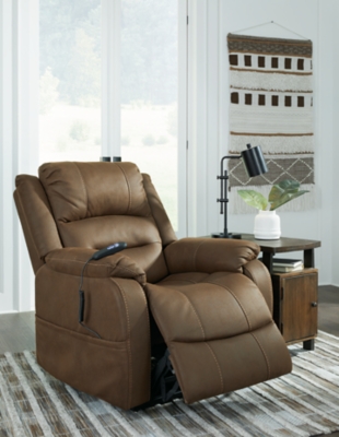 Enjoy comfort to the max in the Whitehill power lift recliner. After sitting and relaxing or snoozing in a fully reclined position, it eases you upright and back on your feet with the touch of a button. Dual motor capability lets you recline back and elevate your legs independently for custom comfort positioning. With USB charging at your fingertips, you can power up electronic devices as you unwind. The heavyweight padded faux leather has long-lasting durability, and its neutral chocolate hue complements most color schemes, so it looks as good as it feels.One-touch (hand control) power button with adjustable positions | Corner-blocked frame with metal seat box | Attached back and seat cushions | High-resiliency foam cushions wrapped in thick poly fiber | Polyester upholstery | Dual motors control the footrest and back independently for custom comfort positioning | USB charging | Power cord included; UL Listed | Estimated Assembly Time: 30 Minutes