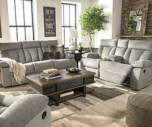 Your to-do list is complete, now it’s time for ultimate relaxation. This double reclining sofa is plush in all the right places, and will support you longer than you can binge watch your favorite TV show. The neutral upholstery is ready for a patterned throw pillow and some of your time. The middle seat’s back drops down into convenient table top with cup holders, the perfect resting spot for tablets and magazines.Dual-sided recliner; middle seat remains stationary | Drop-down center table with 2 cup holders | Pull tab reclining motion | Corner-blocked frame with metal reinforced seat | Attached back and seat cushions | High-resiliency foam cushion wrapped in thick poly fiber | Polyester upholstery