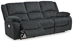 Built for luxury, the Draycoll power reclining sofa lets you kick back in reliable style. The thick, softly textured chenille upholstery provides a comfy surface on which to lounge. With bustle back construction and thickly cushioned armrests, this piece gives you the dependable support you need to unwind while the handy USB port provides the power to keep your devices going.Dual-sided recliner; middle seat remains stationary | One-touch power control with adjustable positions and zero-draw USB plug-in | Zero-draw technology only consumes power when the USB receptacle is in use | Corner-blocked frame | Attached cushions | High-resiliency foam cushions wrapped in thick poly fiber | Polyester upholstery | Power cord included; UL Listed | Estimated Assembly Time: 15 Minutes