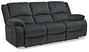 Built for luxury, the Draycoll reclining sofa lets you kick back in reliable style. The thick, softly textured chenille upholstery provides a comfy surface on which to lounge. With bustle back construction and thickly cushioned armrests, this piece gives you the dependable support you need to unwind after a trying day.Dual-sided recliner; middle seat remains stationary | Pull tab reclining motion | Corner-blocked frame | Attached cushions | High-resiliency foam cushions wrapped in thick poly fiber | Polyester upholstery | Estimated Assembly Time: 15 Minutes
