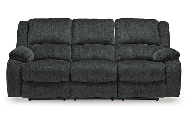 Built for luxury, the Draycoll reclining sofa lets you kick back in reliable style. The thick, softly textured chenille upholstery provides a comfy surface on which to lounge. With bustle back construction and thickly cushioned armrests, this piece gives you the dependable support you need to unwind after a trying day.Dual-sided recliner; middle seat remains stationary | Pull tab reclining motion | Corner-blocked frame | Attached cushions | High-resiliency foam cushions wrapped in thick poly fiber | Polyester upholstery | Estimated Assembly Time: 15 Minutes