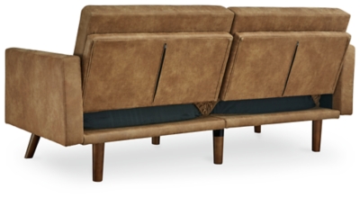 No room at the inn? The Drescher flip flop sofa accommodates your overnight guests, as well as your love of clean-lined, modern style. Wrapped in a fabulous caramel colored faux leather rich with tonal variation for a sense of authenticity, this chic futon/sofa is dressed to impress with slim track arms, a 2-over-2 box cushion design and tapered legs with a faux wood finish. This versatile sofa easily makes itself at home in a main living room if space is limited and can be used as a sofa sleeper in a guest room, rec room or finished basement. The back fully reclines to ensure a good night's sleep. Loose cushions | High-resiliency foam cushions wrapped in thick poly fiber | Polyester/polyurethane upholstery | 2 USB plug-ins; power cord included; UL Listed | Exposed legs with faux wood finish | Estimated Assembly Time: 15 Minutes