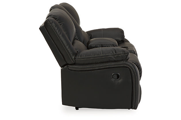 Sleek and streamlined, the Calderwell reclining loveseat with center console draws out your leisure time with its bustle back construction and thickly cushioned armrests. The super soft faux leather gets a high-end tweak with jumbo contrast stitching so you don’t have to sacrifice style for comfort. Sink into the comfortably supportive cushions and stretch your evening as long as you can with the added convenience of a center console at your fingertips.Dual-sided recliner | Pull tab reclining motion | Corner-blocked frame with metal reinforced seats | Attached cushions | High-resiliency foam cushions wrapped in thick poly fiber | Center console with storage and 2 cup holders | Vinyl/polyester/polyurethane upholstery | Estimated Assembly Time: 15 Minutes