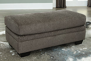 The contemporary Dorsten ottoman has comfort written all over it. From the plush cushion to the textured fabric, it’s a total winner for relaxation. Just throw your feet up and enjoy its warmth. | The contemporary Dorsten ottoman has comfort written all over it. From the plush cushion to the textured fabric, it’s a total winner for relaxation. Just throw your feet up and enjoy its warmth.Polyester upholstery | Exposed feet with faux wood finish | Corner-blocked frame | Exposed feet with faux wood finish | High-resiliency foam cushions wrapped in thick poly fiber | Corner-blocked frame | Polyester upholstery | High-resiliency foam cushions wrapped in thick poly fiber