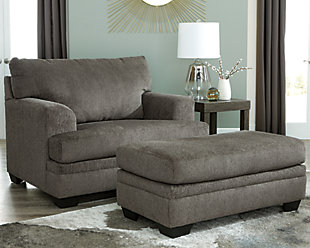 The contemporary Dorsten ottoman has comfort written all over it. From the plush cushion to the textured fabric, it’s a total winner for relaxation. Just throw your feet up and enjoy its warmth.Corner-blocked frame | High-resiliency foam cushions wrapped in thick poly fiber | Polyester upholstery | Exposed feet with faux wood finish