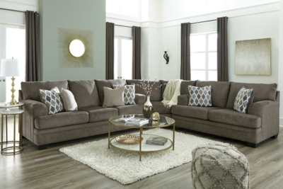 The contemporary Dorsten sofa sleeper has comfort written all over it. From the plush cushions to the textured gray fabric, it’s a total winner for relaxation. Designer throw pillows in blue, brown and tan complement the richly neutral upholstery. Pull-out queen mattress in quality memory foam comfortably accommodates overnight guests.Corner-blocked frame | Attached back and loose seat cushions | High-resiliency foam cushions wrapped in thick poly fiber | 4 decorative pillows included | Pillows with soft polyfill | Polyester upholstery and pillows | Exposed feet with faux wood finish | Included bi-fold queen memory foam mattress sits atop a supportive steel frame | Memory foam provides better airflow for a cooler night’s sleep | Memory foam encased in damask ticking