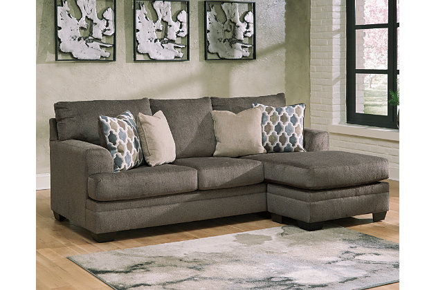 The Dorsten sofa chaise has the corner on ultra-contemporary style made for easy, everyday living. Upholstered in a plush slate chenille, it takes neutral sophistication to another level. And talk about accommodating. Thanks to a versatile chaise with movable ottoman and reversible seat cushions, you can enjoy the chaise on either side to suit your space.Corner-blocked frame | Attached back and loose seat cushions | High-resiliency foam cushions wrapped in thick poly fiber | Polyester upholstery | Throw pillows included | Pillows with soft polyfill | Exposed feet with faux wood finish | Chaise can be positioned on either side (thanks to reversible seat cushion and movable ottoman) | Platform foundation system resists sagging 3x better than spring system after 20,000 testing cycles by providing more even support | Smooth platform foundation maintains tight, wrinkle-free look without dips or sags that can occur over time with sinuous spring foundations