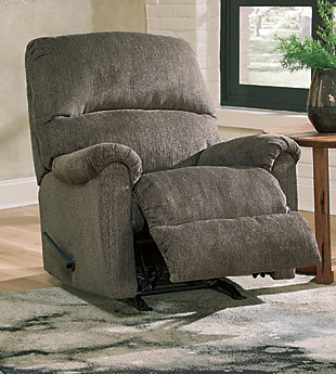 The Dorsten rocker recliner has the corner on ultra-contemporary style made for easy, everyday living. Upholstered in a plush slate chenille, it takes neutral sophistication to another level. Kick back and relax. The look you love comes with a luxurious feel at a price to entice.One-pull reclining motion | Gentle roc motion | Corner-blocked frame with metal reinforced seat | Attached cushions | High-resiliency foam cushions wrapped in thick poly fiber | Polyester upholstery
