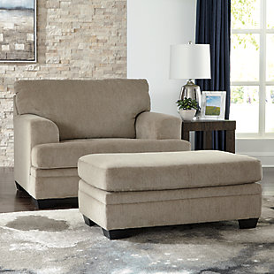 The Dorsten contemporary oversized chair, ottoman and sofa chaise has comfort written all over it. From the wide, plush seating to the textured tan fabric, it’s a total winner for relaxation. Just grab a throw blanket and cozy up to its warmth. Thanks to a versatile chaise with movable ottoman and reversible seat cushions, you can enjoy the chaise on either side to suit your space.Includes oversized chair, ottoman and sofa chaise | Corner-blocked frame | Firmly cushioned ottoman | Oversized chair and sofa chaise with attached back and loose seat cushions | High-resiliency foam cushions wrapped in thick poly fiber | Polyester upholstery | Exposed feet with faux wood finish | Chaise can be positioned on either side (thanks to reversible seat cushion and movable ottoman) | Oversized chair and sofa chaise with platform foundation system resists sagging 3x better than spring system after 20,000 testing cycles by providing more even support | Smooth platform foundation maintains tight, wrinkle-free look without dips or sags that can occur over time with sinuous spring foundations