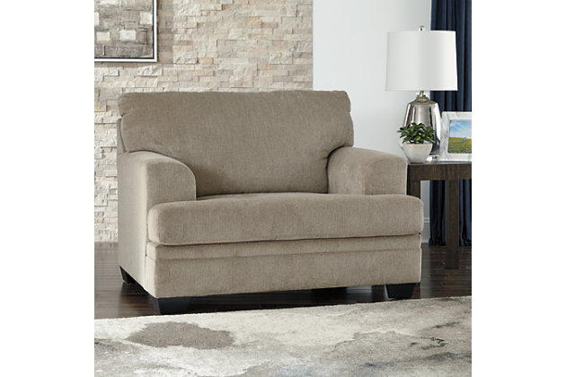 The contemporary Dorsten oversized chair has comfort written all over it. From the wide, plush seat to the textured fabric, it’s a total winner for relaxation. Just grab a throw blanket and cozy up to its warmth.Corner-blocked frame | High-resiliency foam cushions wrapped in thick poly fiber | Polyester upholstery | Exposed feet with faux wood finish | Platform foundation system resists sagging 3x better than spring system after 20,000 testing cycles by providing more even support | Smooth platform foundation maintains tight, wrinkle-free look without dips or sags that can occur over time with sinuous spring foundations