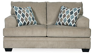 The Dorsten contemporary sofa and loveseat set has comfort written all over it. From the plush cushions to the textured tan fabric, it’s a total winner for relaxation. Designer throw pillows in blue, brown and tan complement the neutral upholstery.Includes sofa and loveseat | Corner-blocked frame | Attached back and loose seat cushions | High-resiliency foam cushions wrapped in thick poly fiber | Toss pillows included | Pillows with soft polyfill | Polyester upholstery and pillows | Exposed feet with faux wood finish | Sofa and loveseat with platform foundation system resists sagging 3x better than spring system after 20,000 testing cycles by providing more even support | Smooth platform foundation maintains tight, wrinkle-free look without dips or sags that can occur over time with sinuous spring foundations