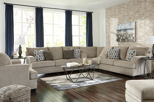 The contemporary Dorsten sofa has comfort written all over it. From the plush cushions to the textured tan fabric, it’s a total winner for relaxation. Designer throw pillows in blue, brown and tan complement the richly neutral upholstery.Corner-blocked frame | Attached back and loose seat cushions | High-resiliency foam cushions wrapped in thick poly fiber | 4 decorative pillows included | Pillows with soft polyfill | Polyester upholstery and pillows | Exposed feet with faux wood finish | Platform foundation system resists sagging 3x better than spring system after 20,000 testing cycles by providing more even support | Smooth platform foundation maintains tight, wrinkle-free look without dips or sags that can occur over time with sinuous spring foundations