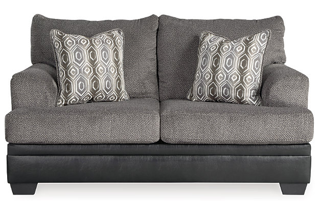 Comfort is inevitable with the Millingar sofa and loveseat. The handsome profile is teeming with chenille softness. Smoky gray textured cushions meet black faux leather for a quality look. Throw pillows season this sofa with extra style flavor—one design with a center button and the other with a trendsetting geometric pattern.Includes sofa and loveseat | Corner-blocked frame | Attached back and loose seat cushions | High-resiliency foam cushions wrapped in thick poly fiber | Toss pillows included | Pillows with soft polyfill | Polyester interior upholstery; vinyl/polyester/polyurethane exterior upholstery | Polyester and polyester/cotton pillows | Exposed feet with faux wood finish | Sofa and loveseat with platform foundation system resists sagging 3x better than spring system after 20,000 testing cycles by providing more even support | Smooth platform foundation maintains tight, wrinkle-free look without dips or sags that can occur over time with sinuous spring foundations