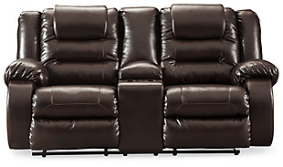 When it comes to comfort, style and value, the Vacherie faux leather reclining loveseat in chocolate brown rocks. Tailored for feel-good flair, its fashion-forward bustle back design is enhanced with sculpted padding on the headrest for cradling support. Channel cushioning along the sides flows into thick, wrapped pillow top armrests that are truly over the top. And while it might look like you broke the bank, a sumptuously soft leather-like fabric keeps indulgence well within budget.Dual-sided recliner | Pull tab reclining motion | Corner-blocked frame with metal reinforced seat | Attached back and seat cushions | High-resiliency foam cushions wrapped in thick poly fiber | Lift-top storage console and 2 cup holders | Vinyl/polyester/polyurethane upholstery