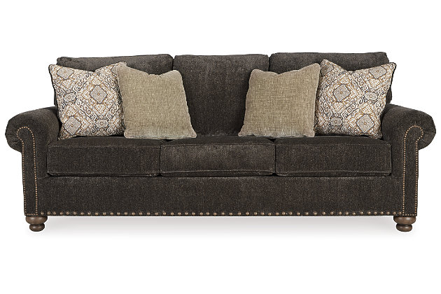 Everyone can have the best seat in the house with the Stracelen sofa sleeper. Nailhead trim puts the finishing touches on the traditional roll arms you love. Reversible seat cushions with high-pile chenille fabric keep it feeling plush. Textured velvet and old world-inspired jacquard pillows add another layer of comfort. Turned feet in burnished light brown finish show that style and quality flow from top to the bottom. Pull-out queen mattress in quality memory foam comfortably accommodates overnight guests.Corner-blocked frame | Attached back and reversible seat cushions | Pewter-tone nailhead trim | High-resiliency foam cushions wrapped in thick poly fiber | 4 decorative pillows included | Pillows with soft polyfill | Polyester upholstery and pillows | Exposed feet with faux wood finish | Included bi-fold queen memory foam mattress sits atop a supportive steel frame | Memory foam provides better airflow for a cooler night’s sleep | Memory foam encased in damask ticking